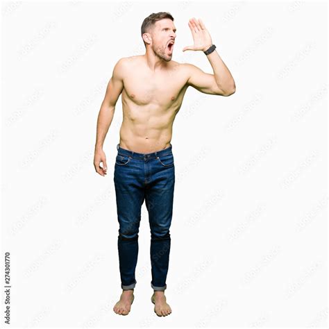 Handsome Shirtless Man Showing Nude Chest Shouting And Screaming Loud To Side With Hand On Mouth