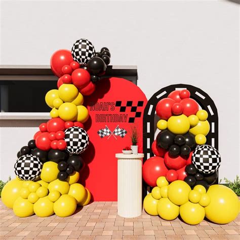 Balloons And Decorations Decorate The Entrance To A Race Car Themed