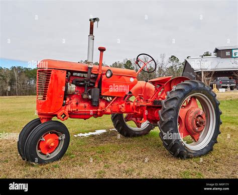 Old Red Vintage Antique Case Farm Tractor On Display At Farm Market In