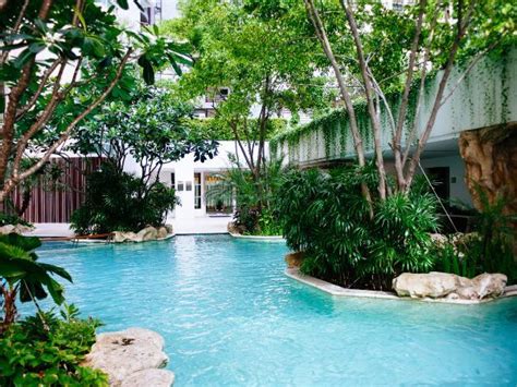 Lagoon Pools: Design Ideas, Pros/Cons & More - Pool Research