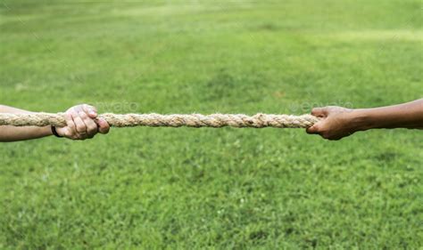 Closeup Of Hand Pulling The Rope In Tug Of War Game Stock Photo By Rawpixel