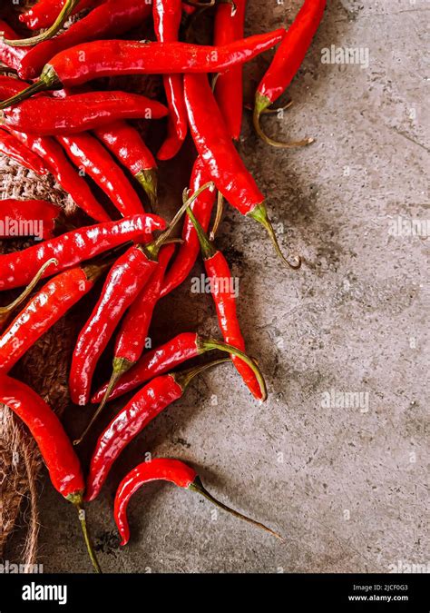 Fresh Red Chili Peppers On Vintage Cloth Background Fresh Red Chilli