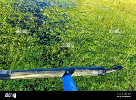 Helicopter Landing skid top view in flight above the Okavango Delta ...