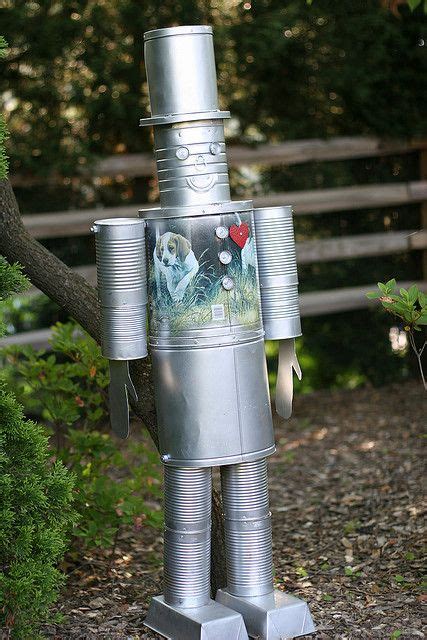 Tin Man Garden Junk Or Garden Art Tin Can Centerpieces Tin Can Art Tin Can Crafts