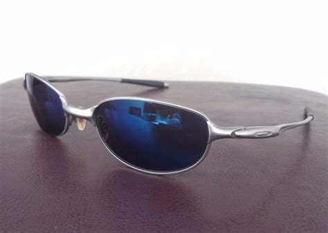 Oakley E Wire 2.1 Sunglasses Silver frame with Ice Iridium Lenses | in ...