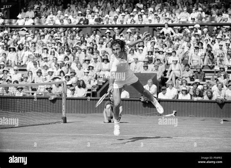 Ilie Nastase Romanian Tennis Player In Action On Centre Court