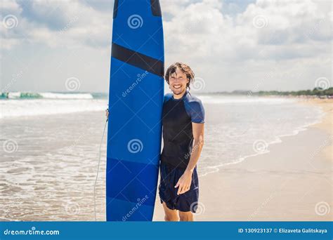 Man Carrying Surfboard Over His Head Close Up Of Handsome Guy W Stock