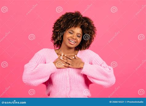 Smiling Pretty Millennial African American Curly Female In Casual Wear