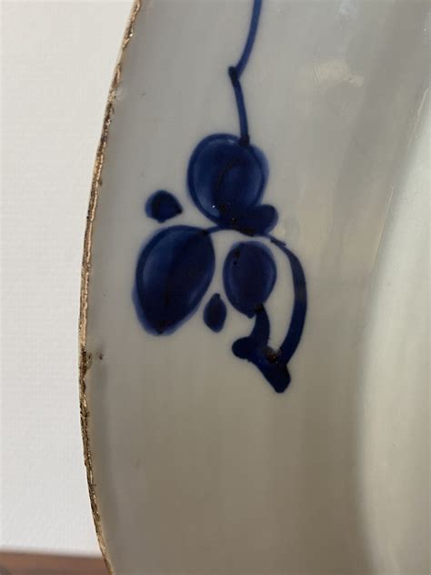 A Chinese Dutch Market Blue And White Armorial Dish With The Arms Of