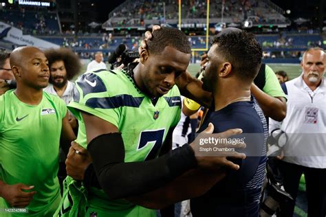 Geno Smith Of The Seattle Seahawks And Russell Wilson Of The Denver News Photo Getty Images