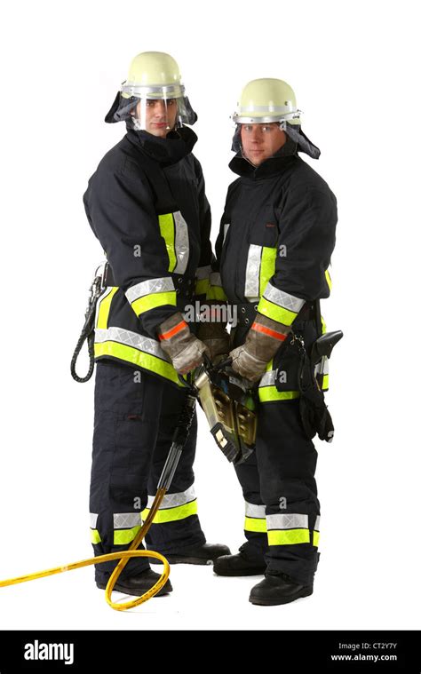 Fire Fighters With Rescue Equipment Hydraulic Metal Spreader Stock