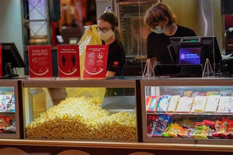 As movie theaters reopen nationwide, some employees are reluctant to return: 'They really are ...