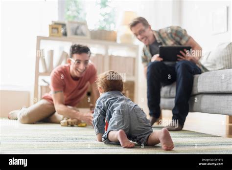 Gay Couple Relaxing On Sofa Hi Res Stock Photography And Images Alamy