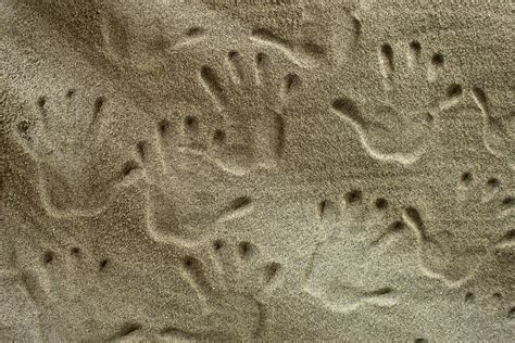 Handprints In The Sand 27085625 Stock Photo at Vecteezy