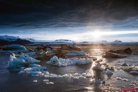 Dramatic Midnight Sun At Jokulsarlon Glacial Lake Iceland Royalty