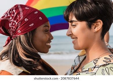 Romantic Lesbian Couple Rainbow Flag Staring Stock Photo 2087837644 Shutterstock
