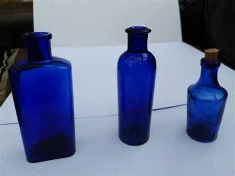 VINTAGE OLD ANTIQUE Cobalt Blue Poison Bottle Castor Oil For Cattle 50