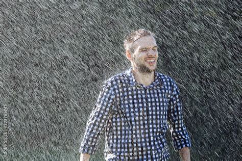 man wet under rain farmer hat enjoy prayer happy upset heavy wet water shower sun summer pray ...