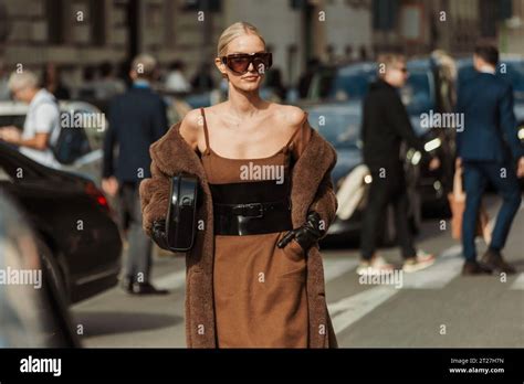 Leonie Hanne Wears Brown Dress Black Corset Gloves Teddy Coat Seen