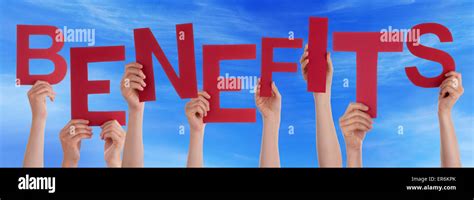 People Hands Holding Red Word Benefits Blue Sky Stock Photo Alamy