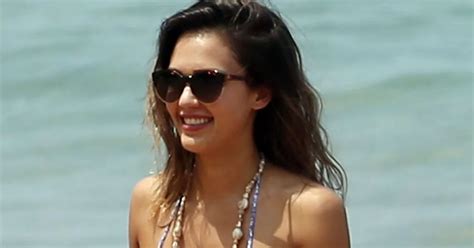Jessica Alba Showcases Her Toned Figure In A Skimpy Bikini As She Soaks