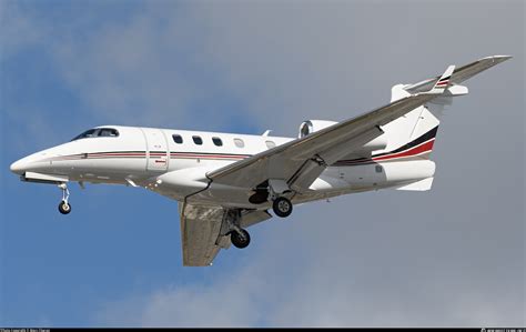 N394QS NetJets Aviation Embraer Phenom 300 EMB 505 Photo By Marc