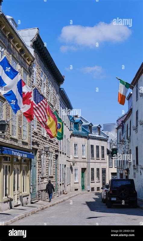 Flags Of Quebec Canada Usa And Spain Outside A Building In The Old