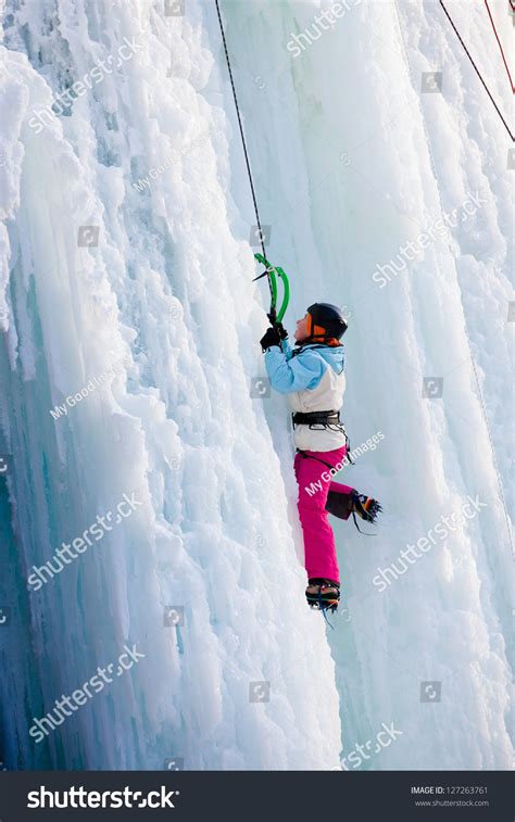 Man Climbing Frozen Waterfall Stock Photo Shutterstock