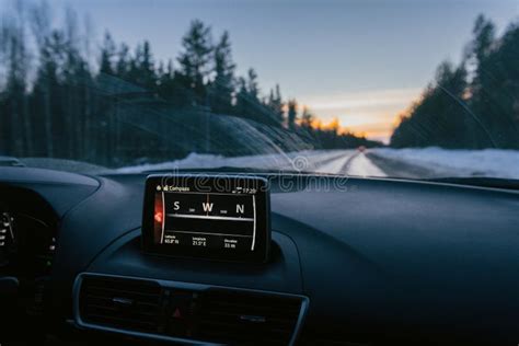 Closeup of a Digital Compass on a Dashboard of a Modern Car Driving ...