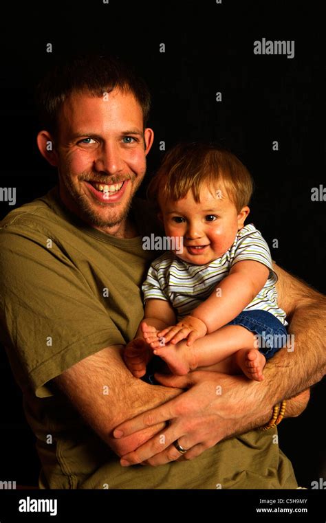 Father Carrying His Son Stock Photo Alamy