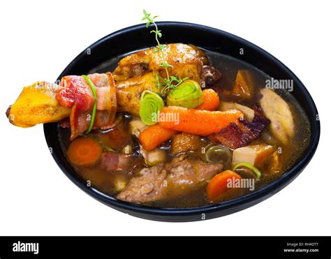 Scottish Cuisine Traditional Chicken Soup Dish Cock A Leekie With Leeks In Black Plate