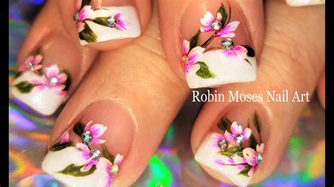 Pink Flowers On French Tip Nails Romantic Floral Nail Art Design