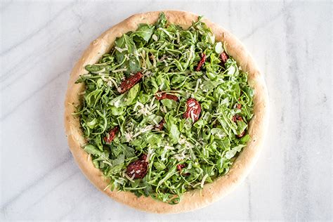 White Pizza With Arugula And Sun Dried Tomatoes