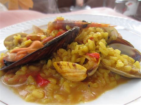 Deliciosa Gula ARROZ CALDOSO DE ALMEJAS Y MEJILLONES CON GAMBÓN Y