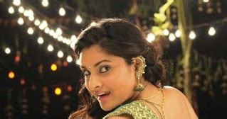 Divya Spandana Exposing Hot And Showing Navel And Cleavage