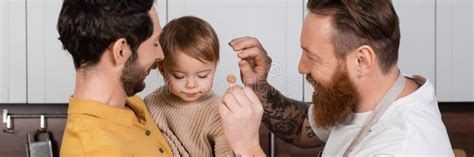 Smiling Gay Fathers Holding Barrette Near Stock Image Image Of Homosexuality Adult