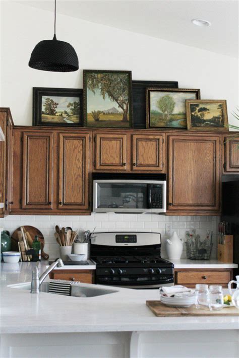 10 Ways To Decorate Above Your Kitchen Cabinets