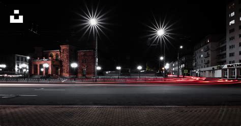 A city street at night with street lights photo – Free Mogilev Image on ...