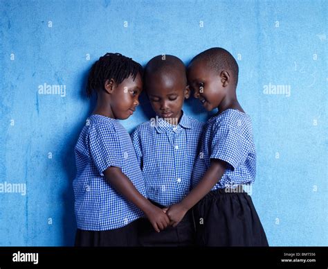 Three African children holding hands after the Rwandan genocide Stock ...