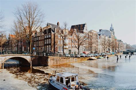 Amsterdam's Frozen Canals - Ice Skating on Grachten in Winter