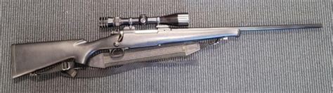 Winchester 25-06 Rifle w/ Redfield Tracker Scope | Live and Online Auctions on HiBid.com