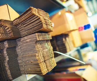 Stacks Of Cardboard Boxes On Display In A Store Stock Photo Images