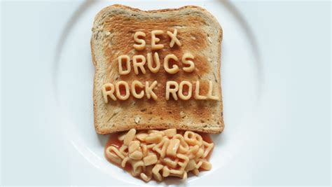 Sex Drugs Rock N Roll Written With Spaghetti Pasta Letters In Tomato Sauce On Toast Stock