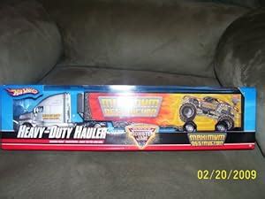 Amazon HOT WHEELS MONSTER JAM HEAVY DUTY HAULER MAXIMUM DESTRUCTION 1 64 SCALE Toys Games