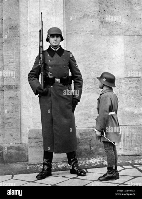 Wehrmacht soldier with boy, 1939 Stock Photo - Alamy