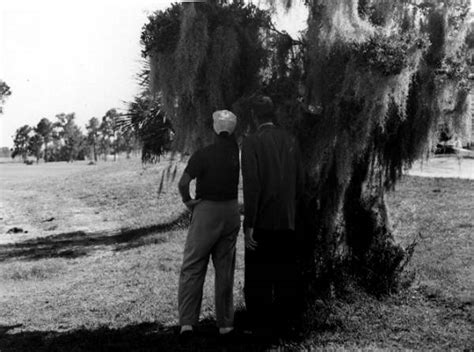 Florida Memory Unidentified Men Look Out On The Golf Course