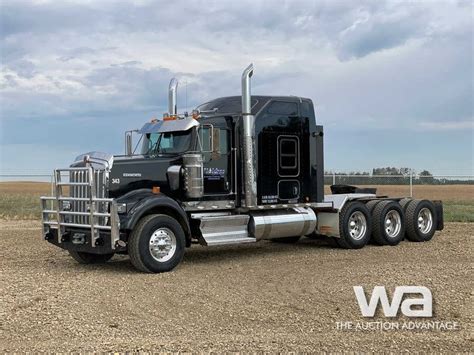 Kenworth W Sleeper Tri Drive Truck Tractor