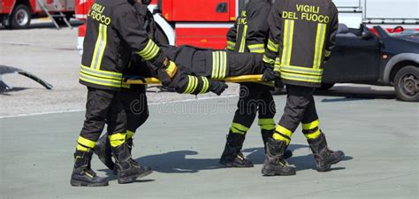 Firefighter in Action with Foam To Put Out the Fire Stock Image - Image ...