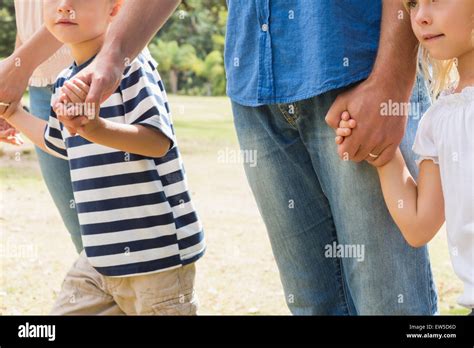 Family holding their hands Stock Photo - Alamy