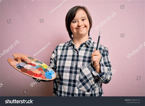 Young Down Syndrome Artist Woman Holding Stock Photo 1688672125 | Shutterstock